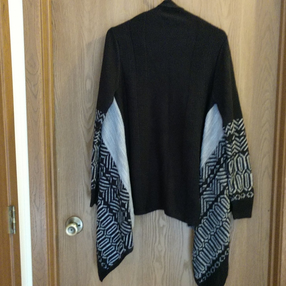 Shrug - Picture 3 of 3